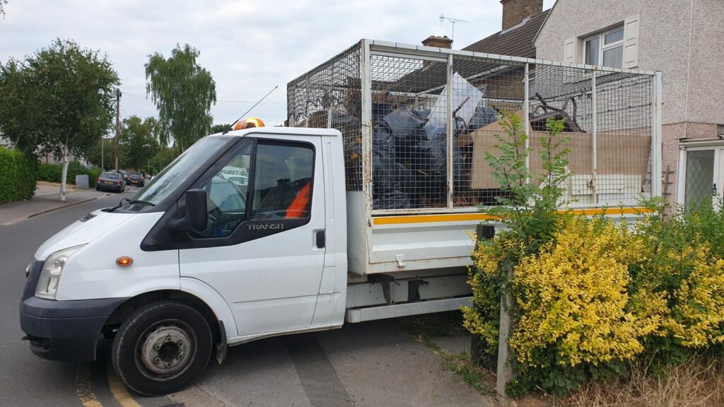 Capital Recycle caged tipper in full livery, the vehicle used for wait and load collections in London
