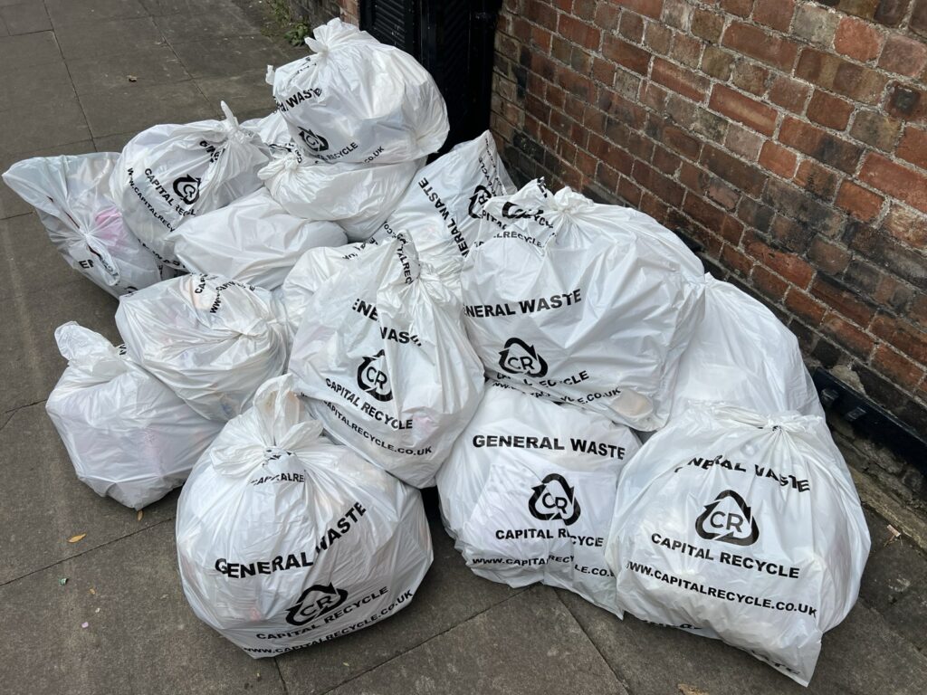 White Capital Recycle general waste sacks ready for collection