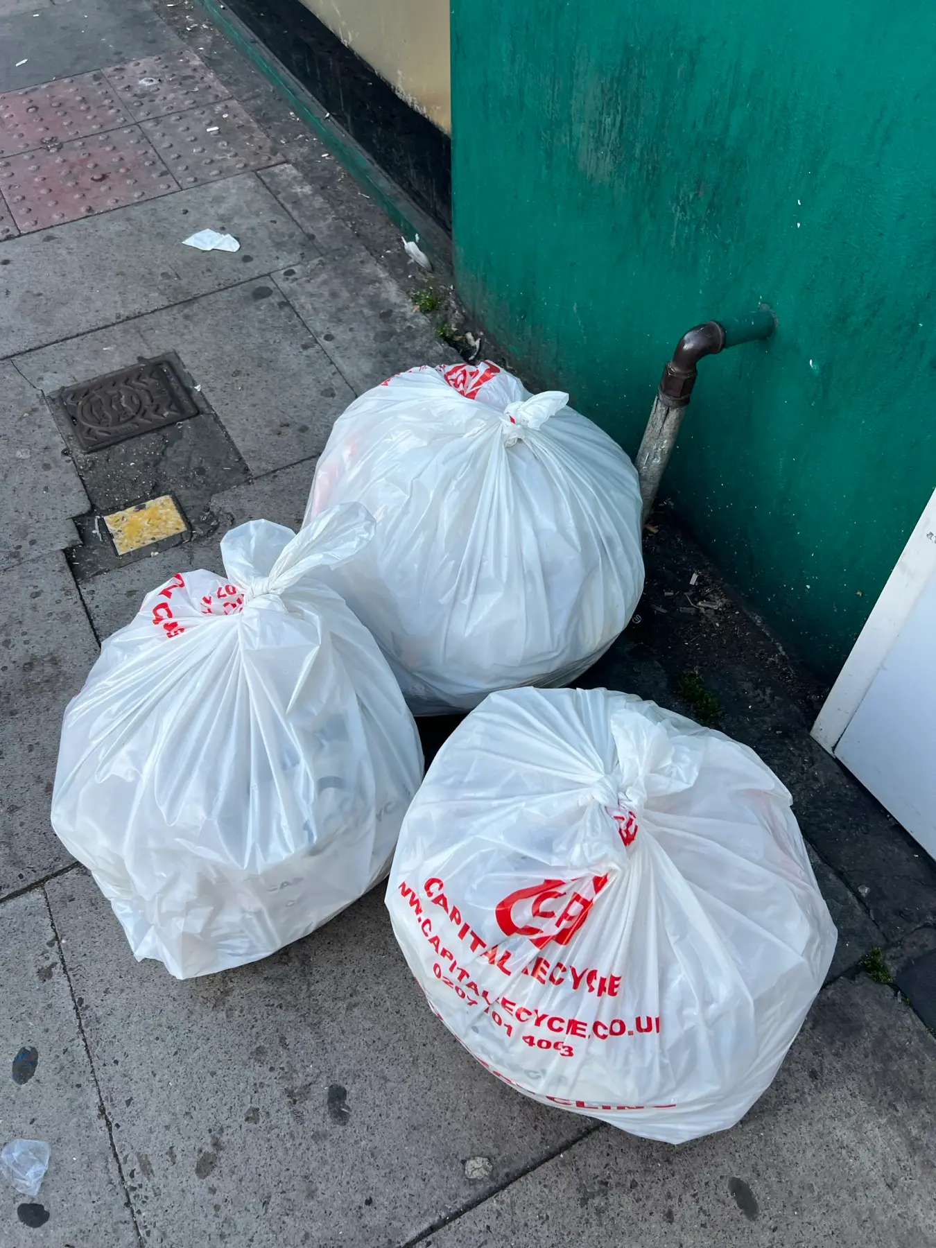 Office waste collection: Capital Recycle sacks ready at a London office entrance